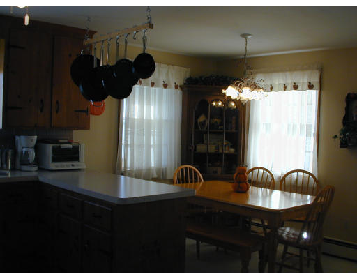 34 Friend Street Taunton, MA 02780 - Photo 8 of 8 a kitchen with a sink stainless steel appliances and cabinets