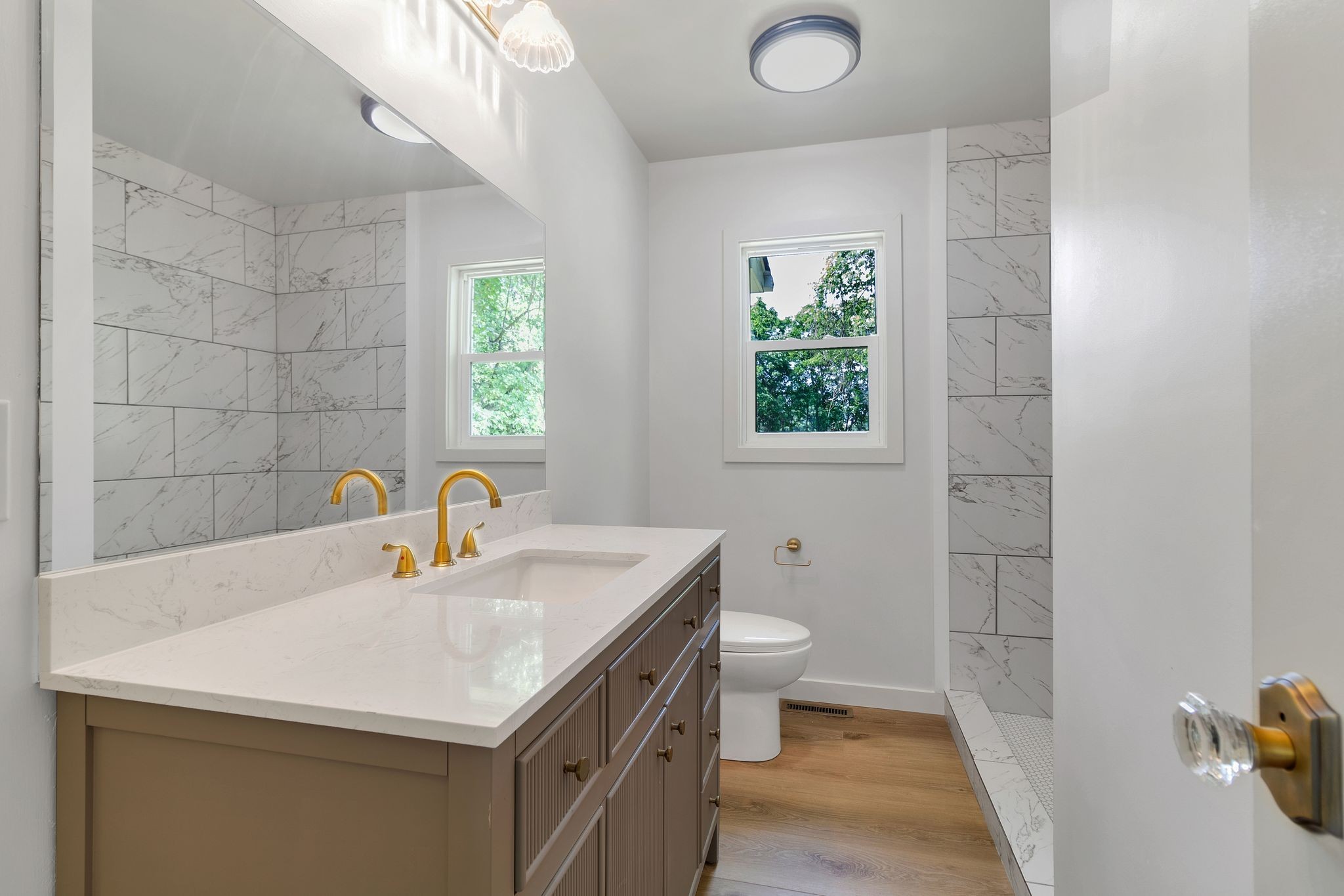 1441 Compton Road Murfreesboro, TN 37130 - Photo 19 of 26 a bathroom with a sink a toilet and shower