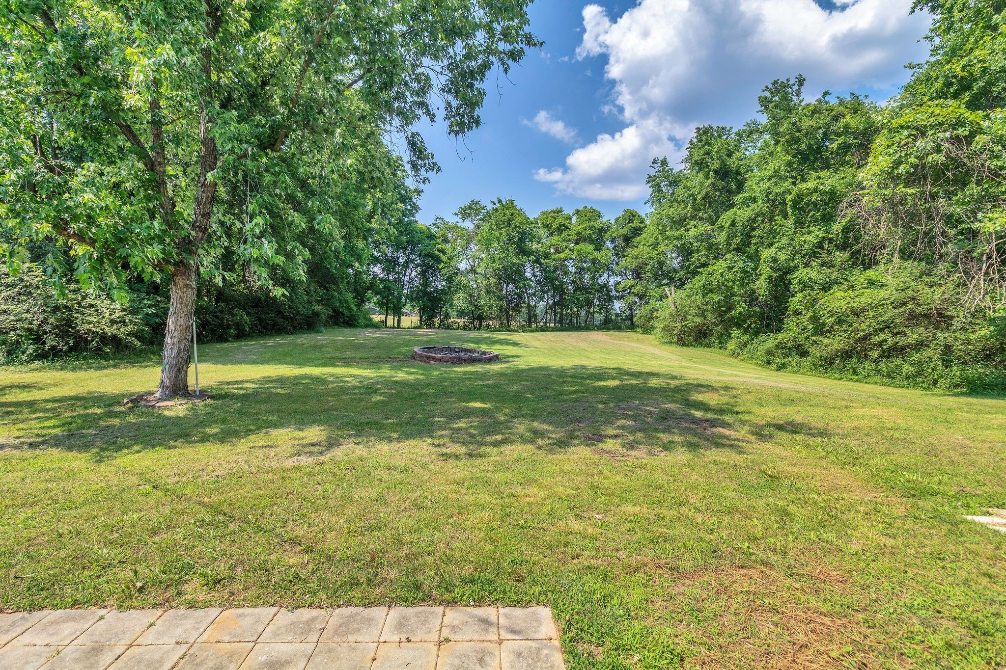 1441 Compton Road Murfreesboro, TN 37130 - Photo 24 of 26 a view of a field with a tree