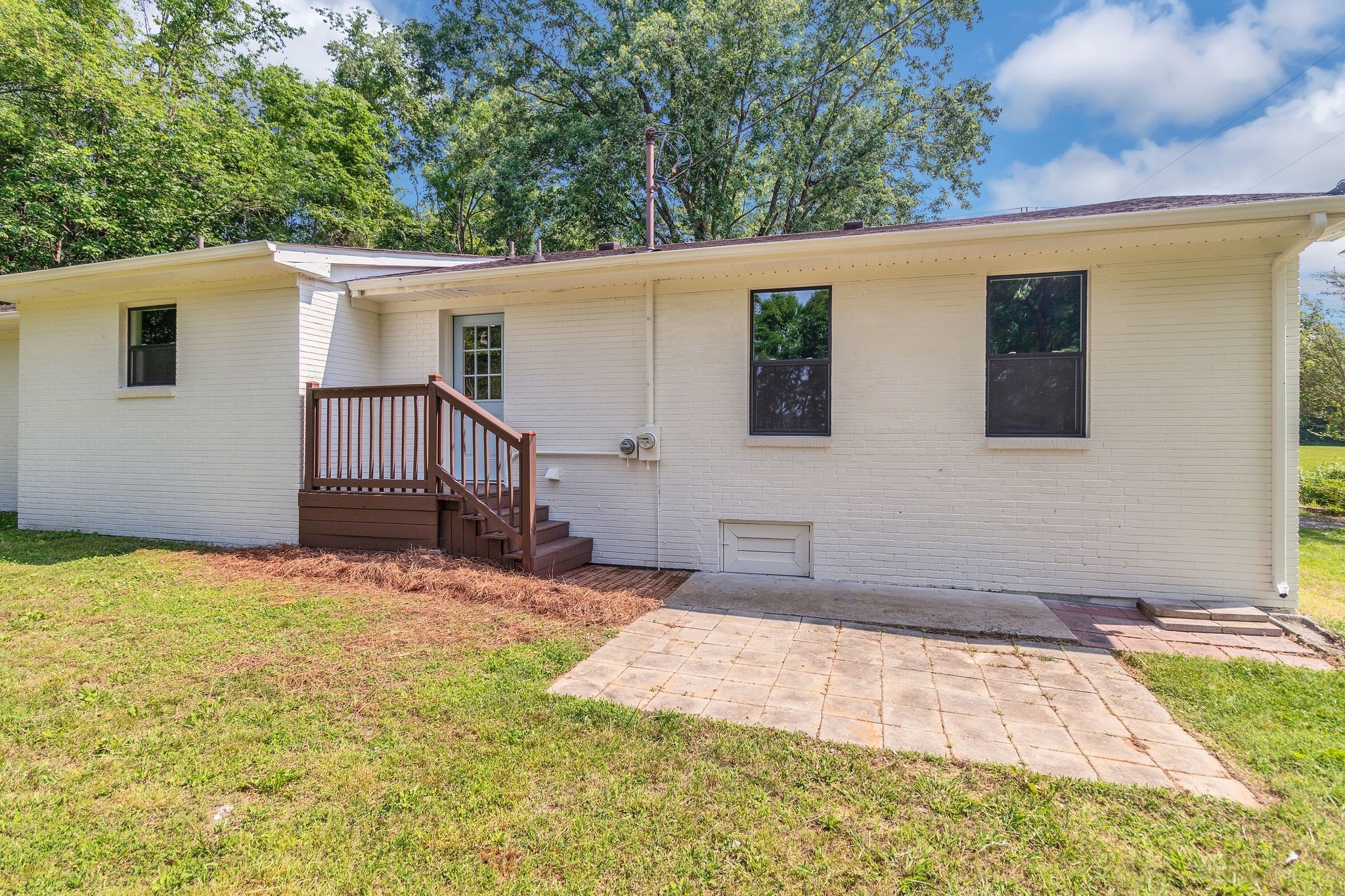 1441 Compton Road Murfreesboro, TN 37130 - Photo 25 of 26 a backyard of a house with table and chairs