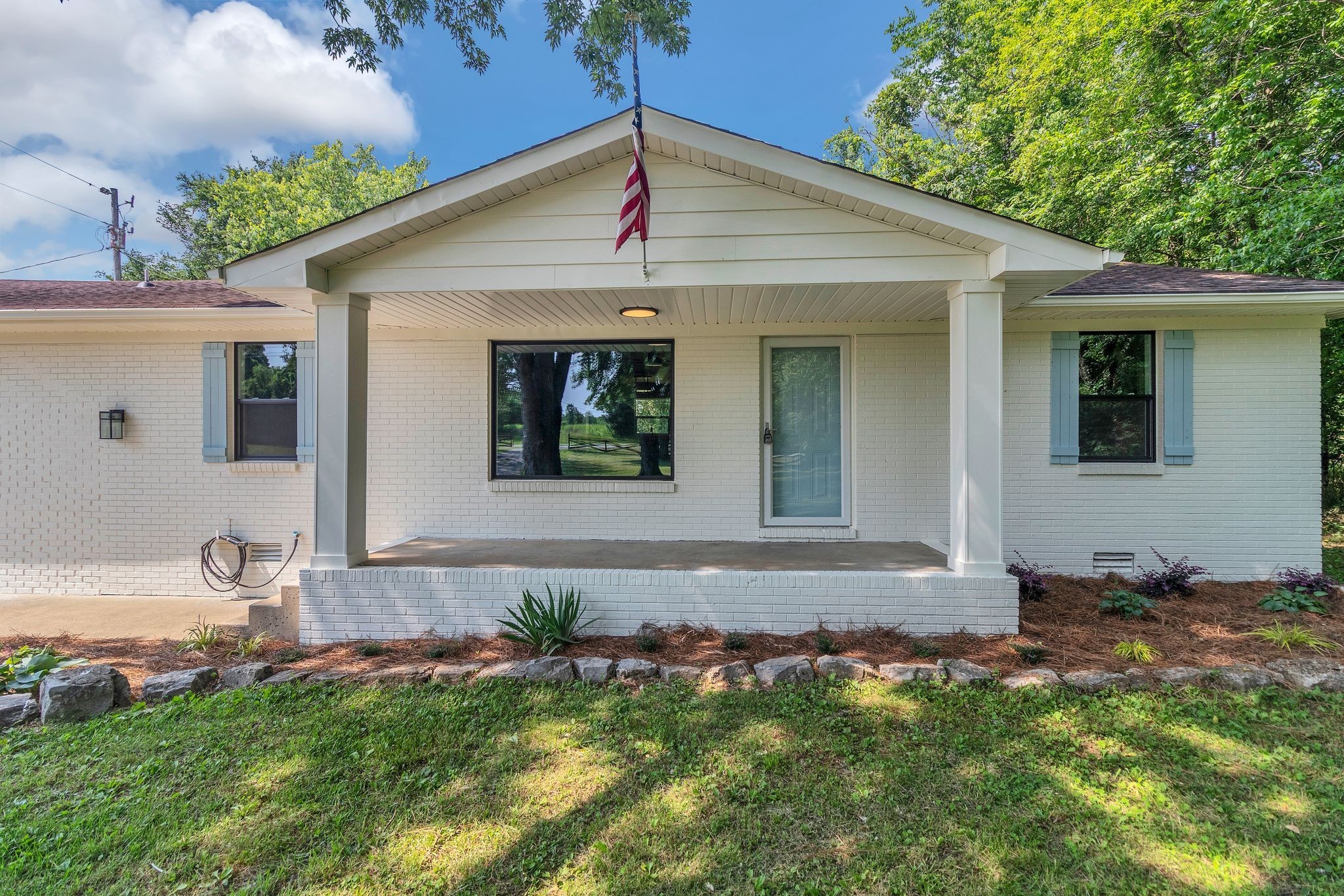 1441 Compton Road Murfreesboro, TN 37130 - Photo 3 of 26 a front view of a house with a yard