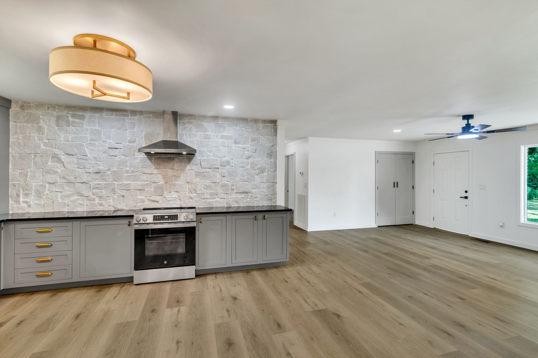 1441 Compton Road Murfreesboro, TN 37130 - Photo 7 of 26 an empty room with wooden floor and windows