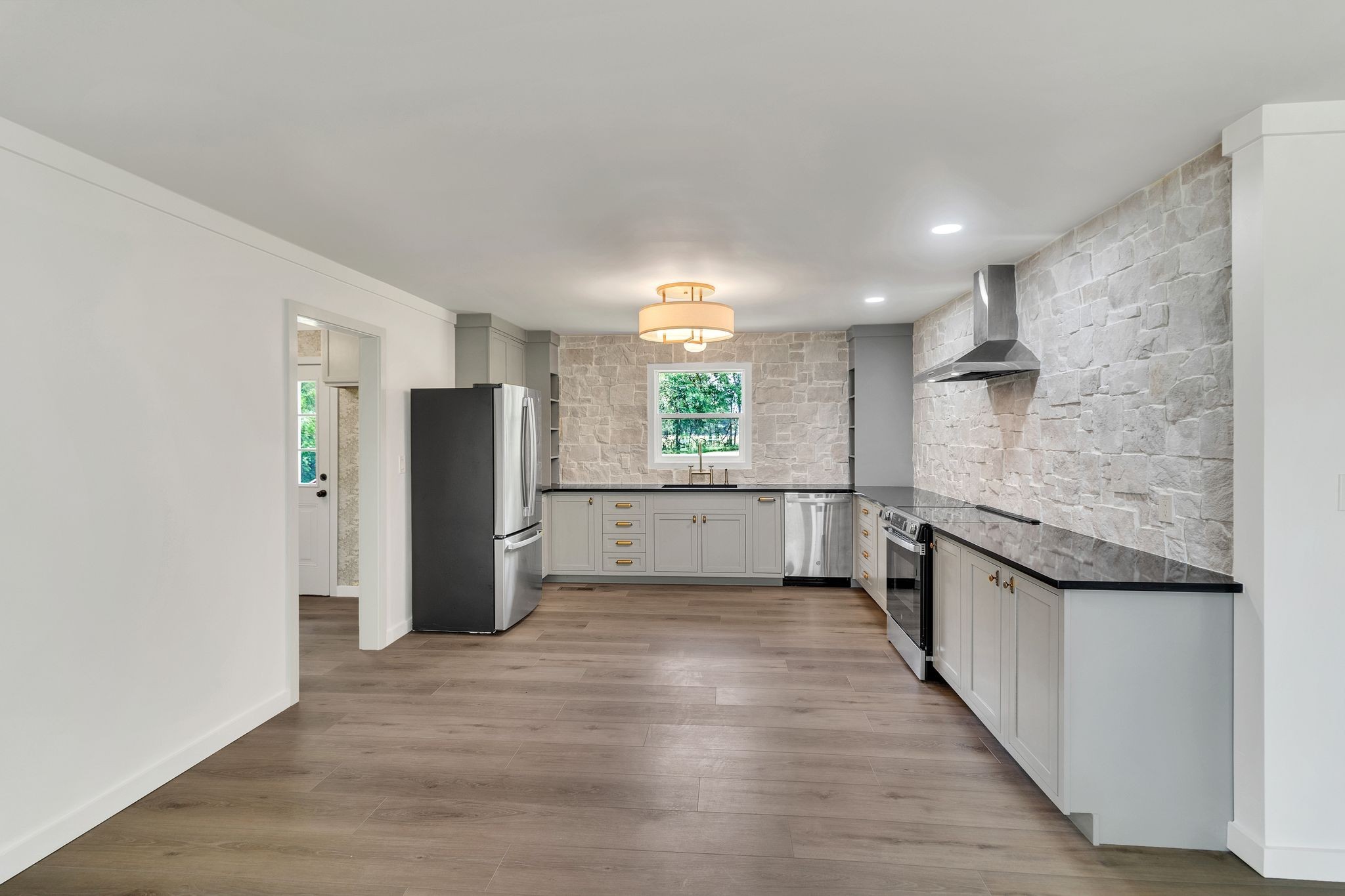1441 Compton Road Murfreesboro, TN 37130 - Photo 8 of 26 a kitchen with stainless steel appliances granite countertop a refrigerator and a sink