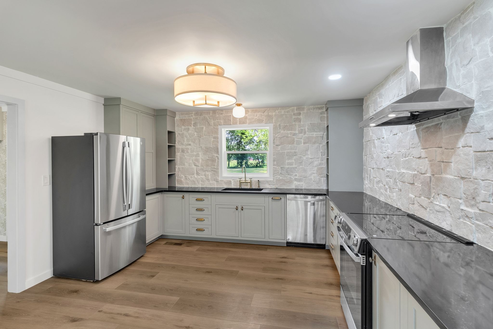 1441 Compton Road Murfreesboro, TN 37130 - Photo 9 of 26 a kitchen with granite countertop a refrigerator and a sink