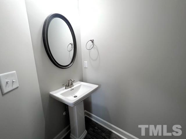 620 Ballance Road Fremont, NC 27830 - Photo 19 of 40 a bathroom with a sink and a mirror
