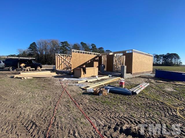 620 Ballance Road Fremont, NC 27830 - Photo 3 of 40 a roof deck with table and chairs a barbeque