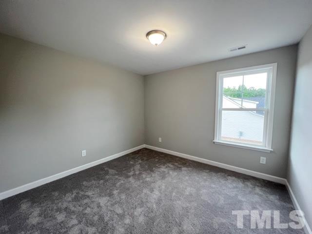 620 Ballance Road Fremont, NC 27830 - Photo 31 of 40 an empty room with a window