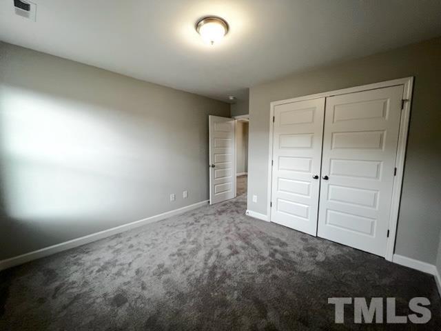 620 Ballance Road Fremont, NC 27830 - Photo 32 of 40 an empty room with closet area