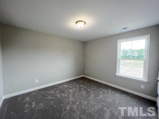 620 Ballance Road Fremont, NC 27830 - Photo 33 of 40 an empty room with a window