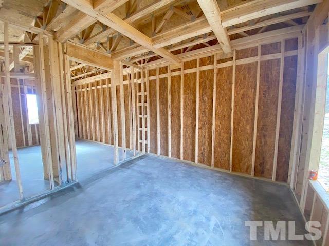 620 Ballance Road Fremont, NC 27830 - Photo 5 of 40 a view of empty room with wooden walls