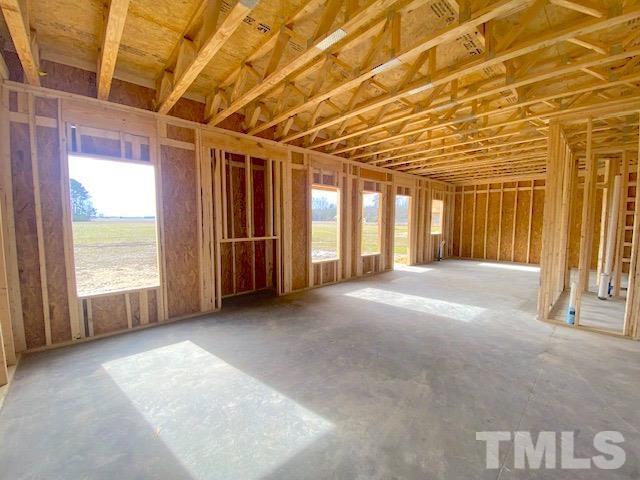 620 Ballance Road Fremont, NC 27830 - Photo 6 of 40 a view of an empty room with a fireplace