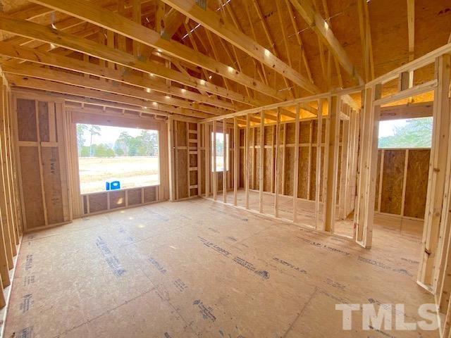 620 Ballance Road Fremont, NC 27830 - Photo 9 of 40 a view of a room with wooden walls and windows