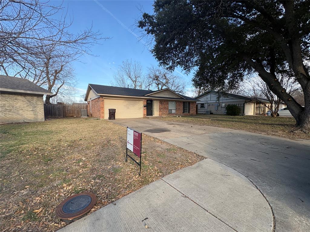 3309 Ridgeglen Circle Plano, TX 75074 - Photo 15 of 26 a front view of a house with a yard