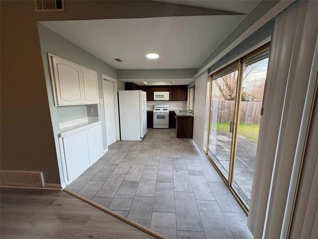3309 Ridgeglen Circle Plano, TX 75074 - Photo 17 of 26 a view of hallway with cabinets