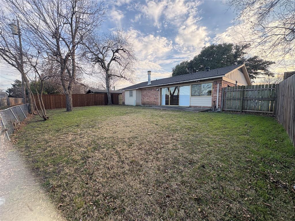 3309 Ridgeglen Circle Plano, TX 75074 - Photo 23 of 26 a view of a house with a yard