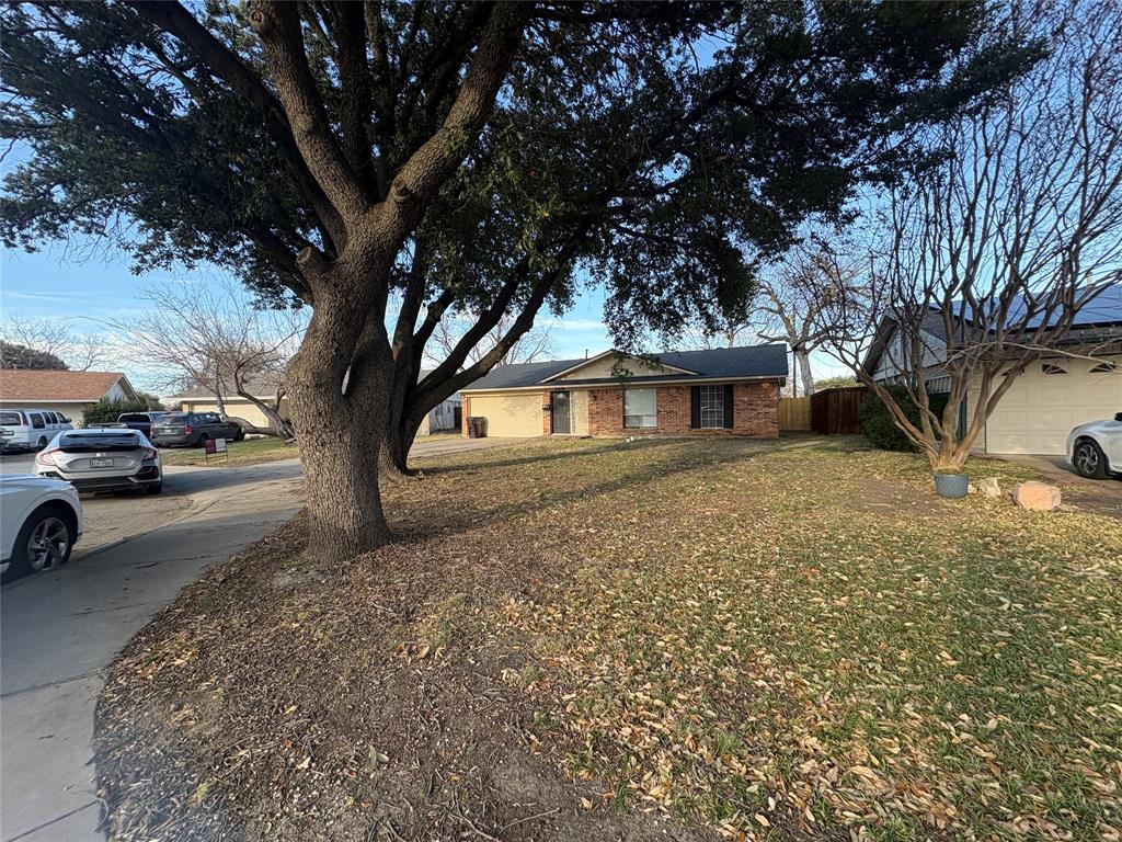 3309 Ridgeglen Circle Plano, TX 75074 - Photo 25 of 26 a view of a house with a yard