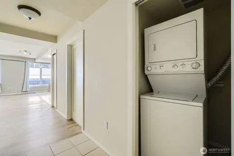 a view of a storage & utility room with washer and dryer