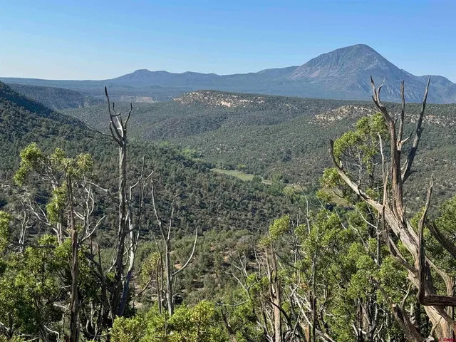 a view of an outdoor space and mountain view in back