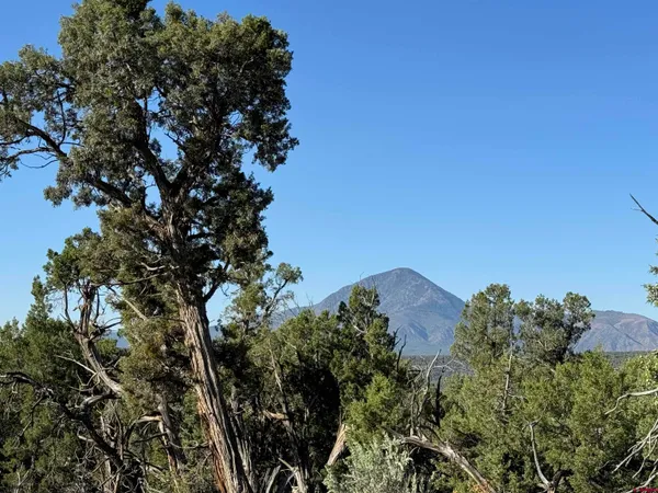 a view of a large outdoor space with mountain view