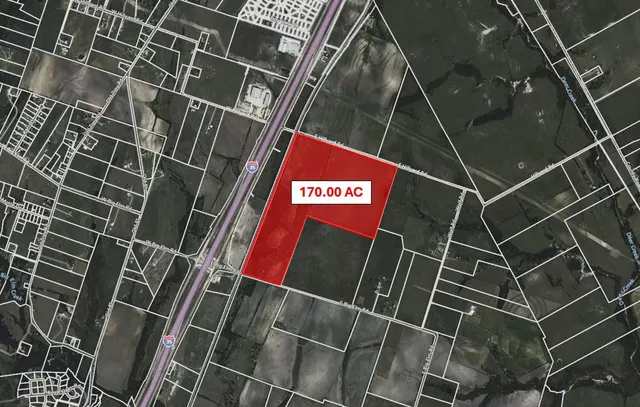 a close up of a street sign and building