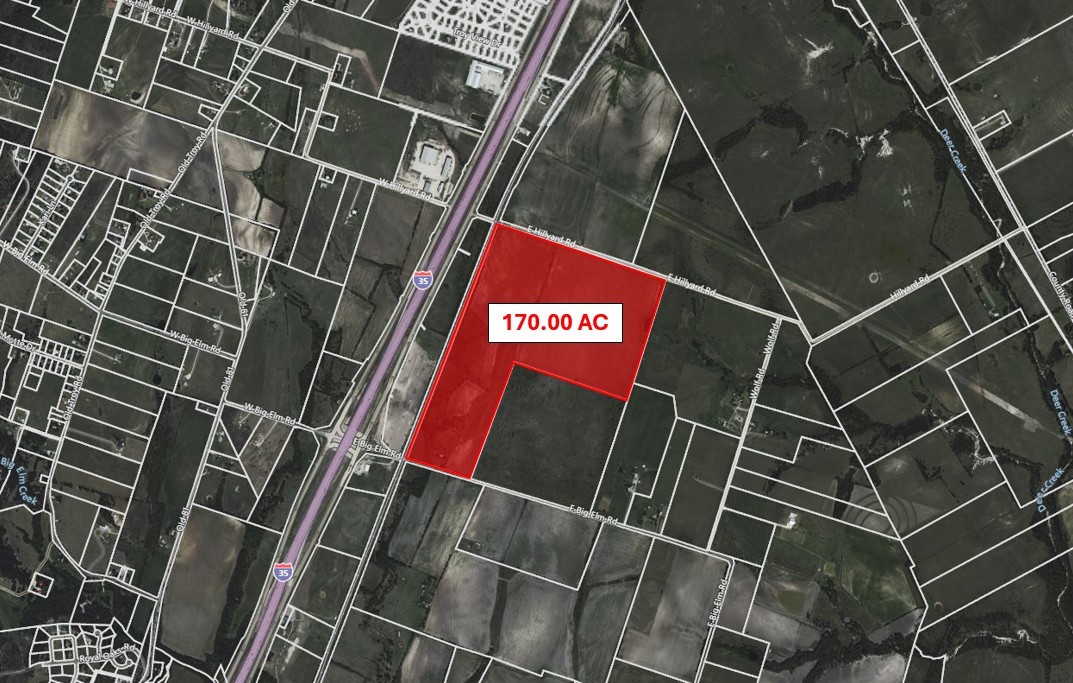 a close up of a street sign and building