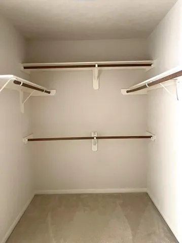 a view of a refrigerator with white paint