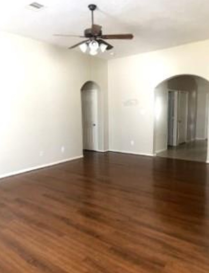21942 Gosling Cedar Place Spring, TX 77388 - Photo 21 of 40 a view of an empty room with wooden floor