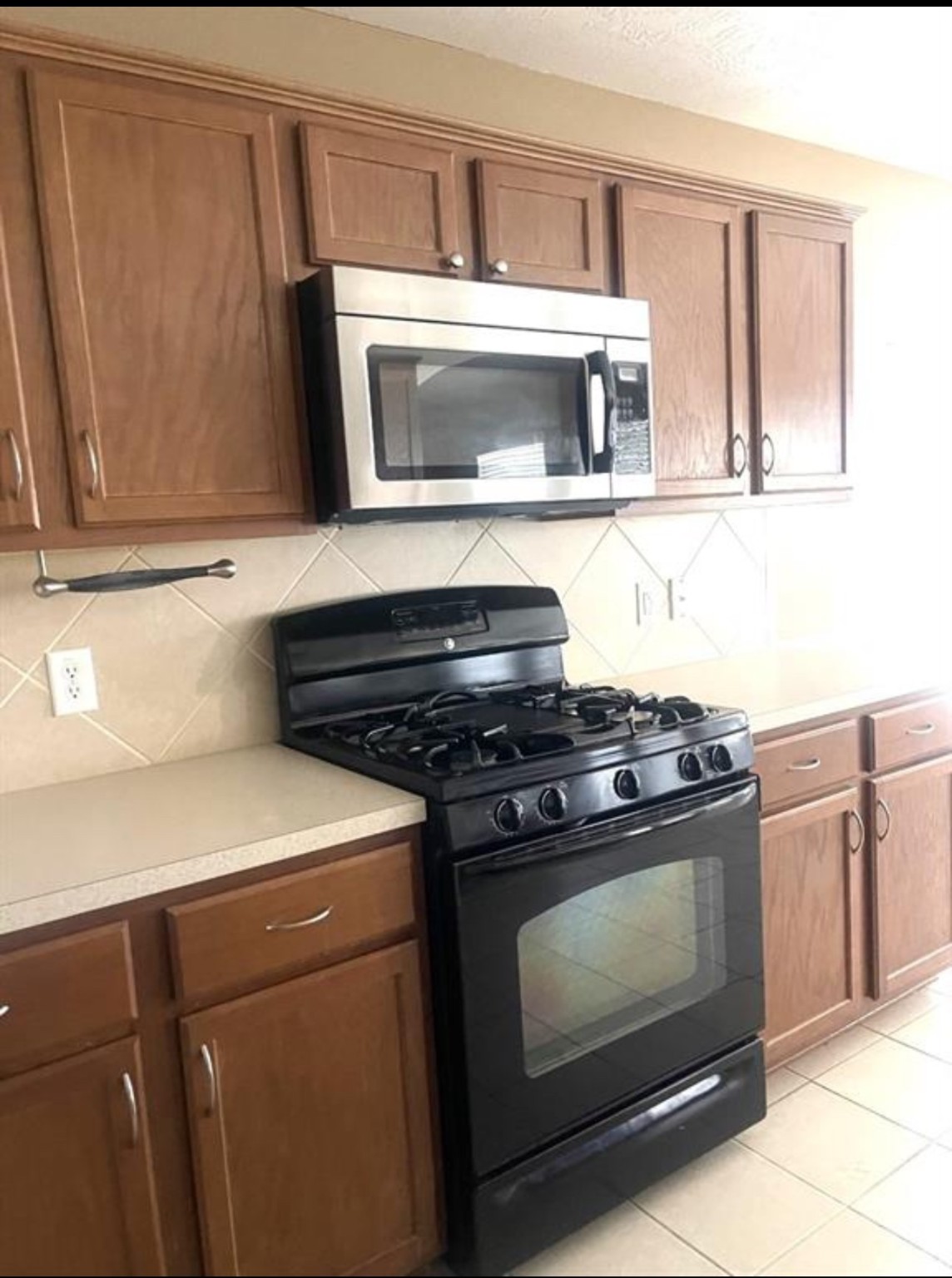 21942 Gosling Cedar Place Spring, TX 77388 - Photo 22 of 40 a stove top oven sitting inside of a kitchen