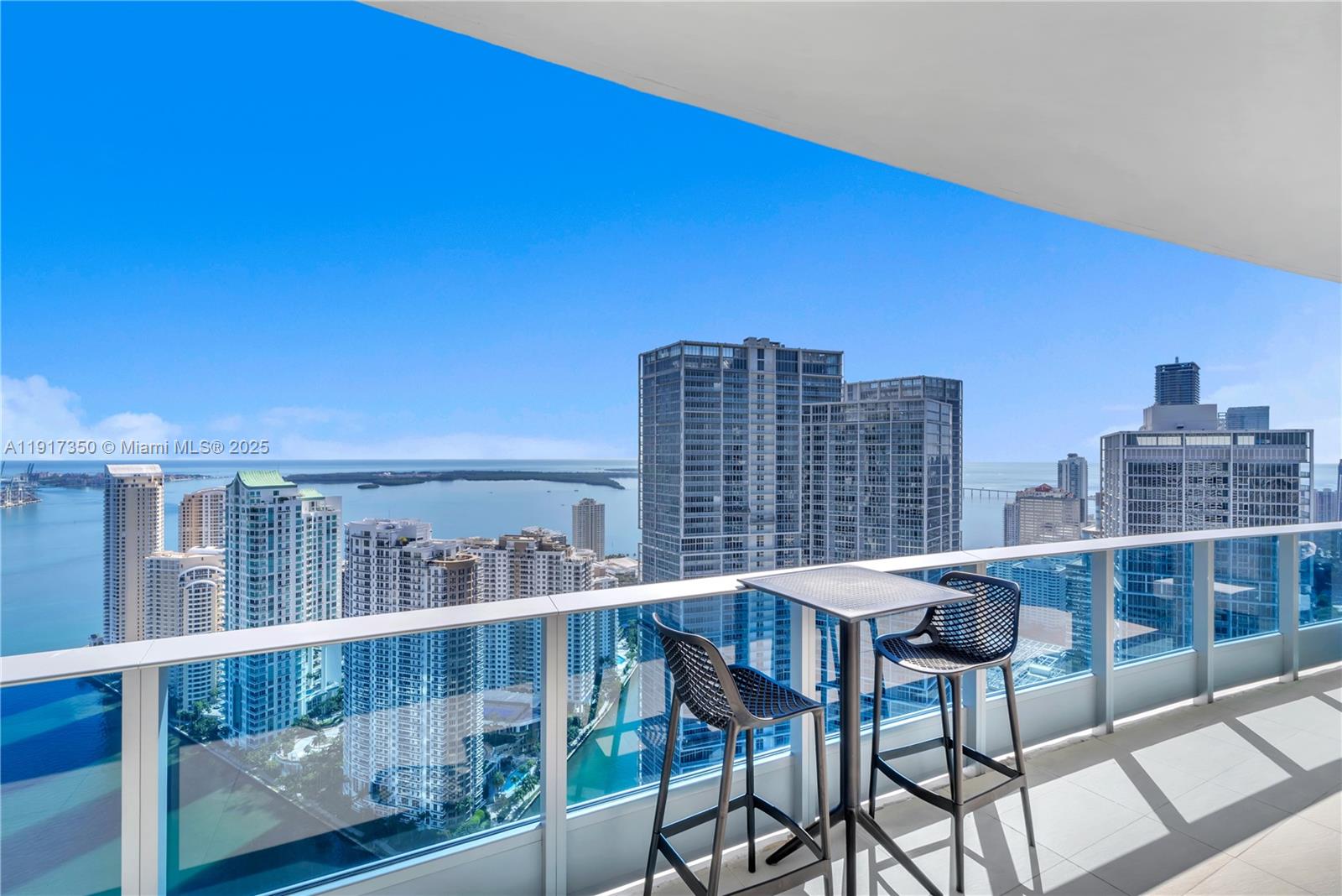 200 Biscayne Blvd Way, Unit 5103 Miami, FL 33131 - Photo 21 of 32 a view of a balcony with furniture