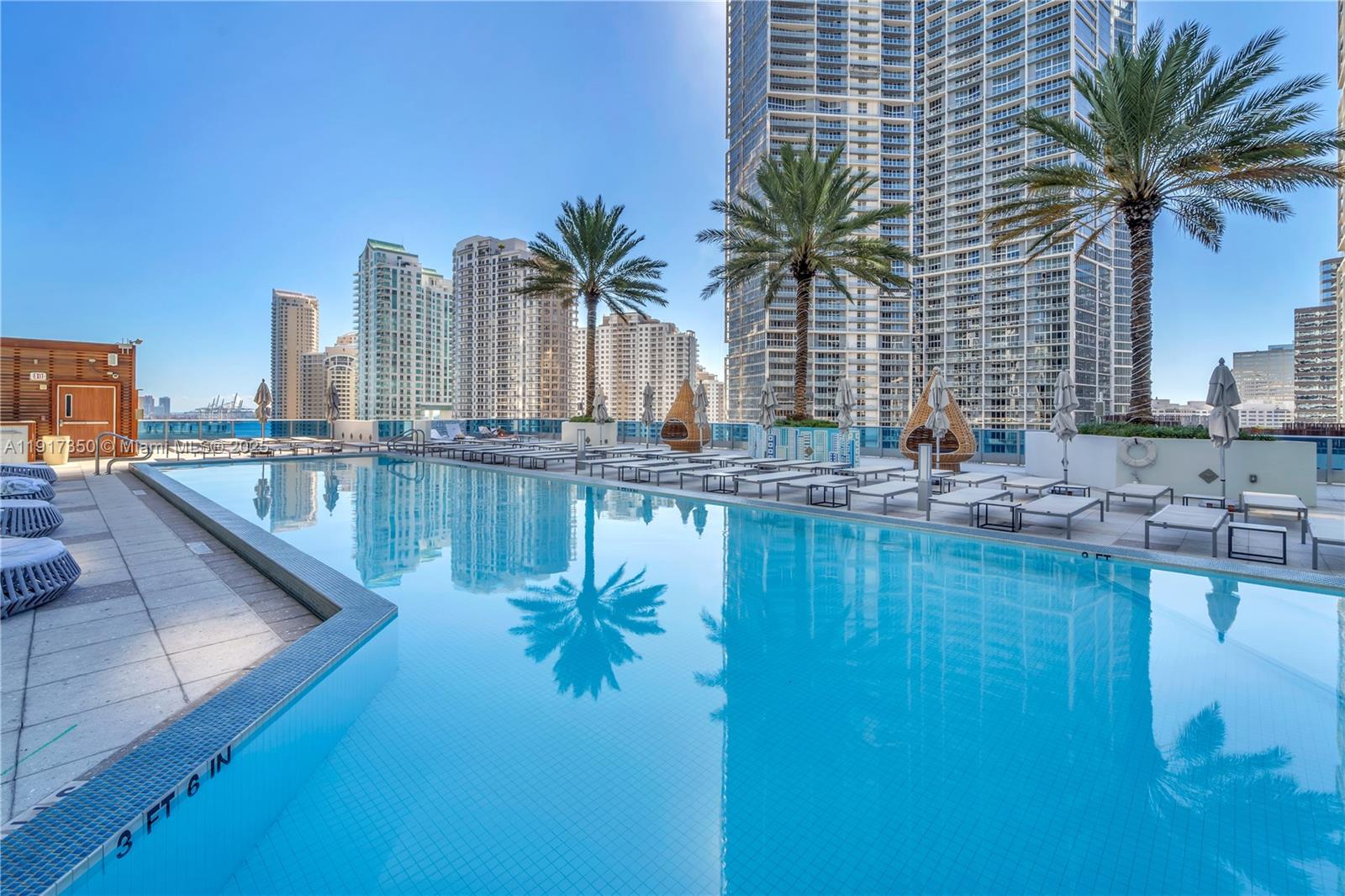 200 Biscayne Blvd Way, Unit 5103 Miami, FL 33131 - Photo 32 of 32 a swimming pool with outdoor seating and yard