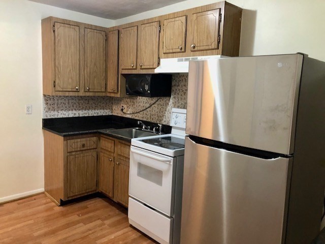 116 Spring Street, Unit C 7 Boston, MA 02132 - Photo 8 of 9 Gallery Image 8