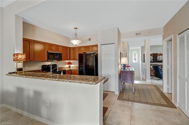 $292,450 | 10121 Villagio Palms Way, Unit 201, Estero, FL 33928