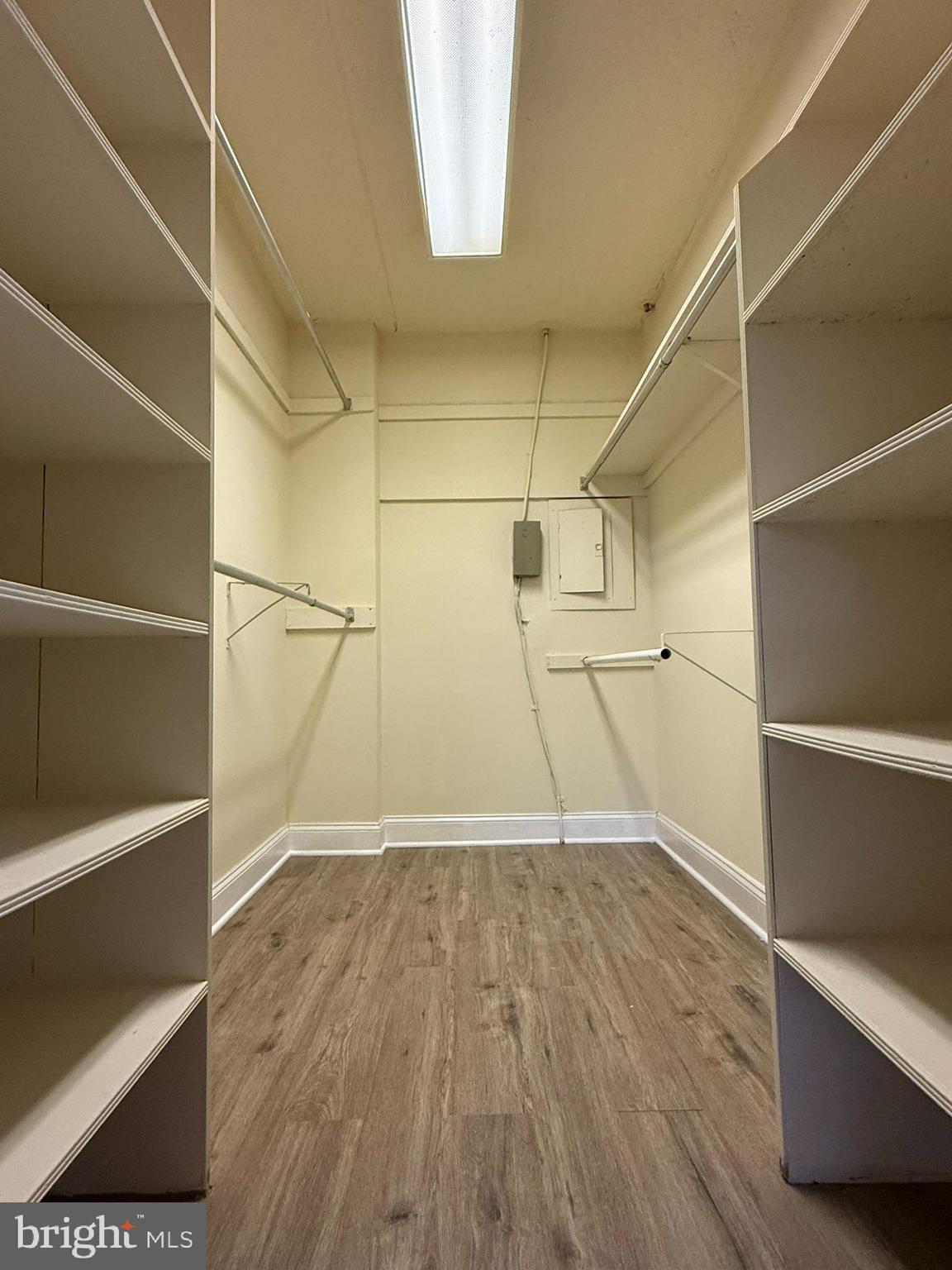 860 Lower Ferry Road, Unit 2K Ewing, NJ 08628 - Photo 13 of 14 a view of empty room with wooden floor and fan