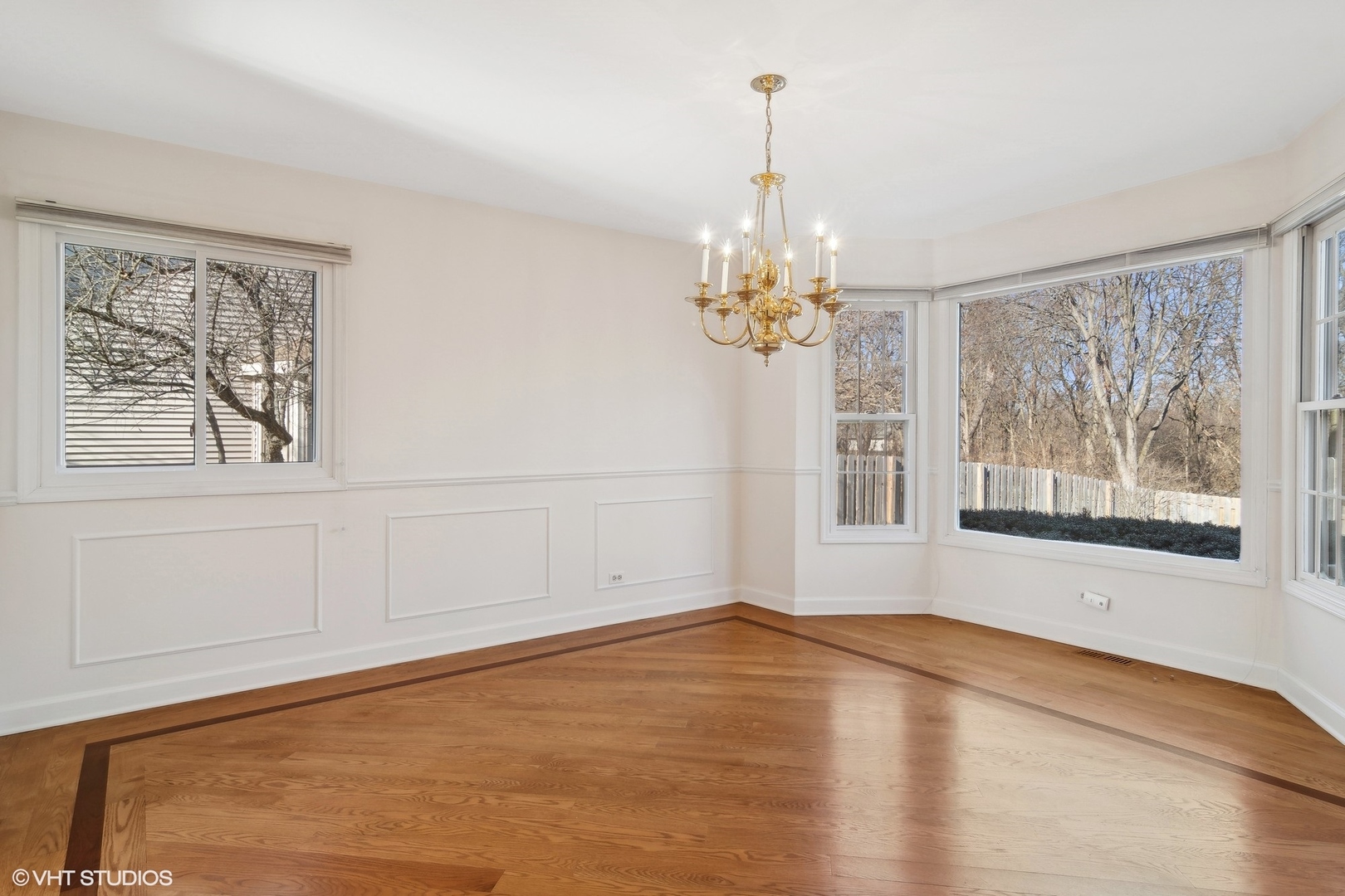 642 Raintree Road Buffalo Grove, IL 60089 - Photo 3 of 28 a view of an empty room with a window