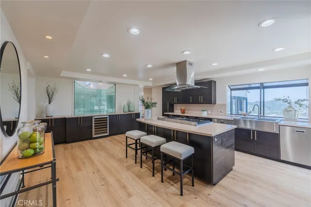 a kitchen with a table and chairs in it