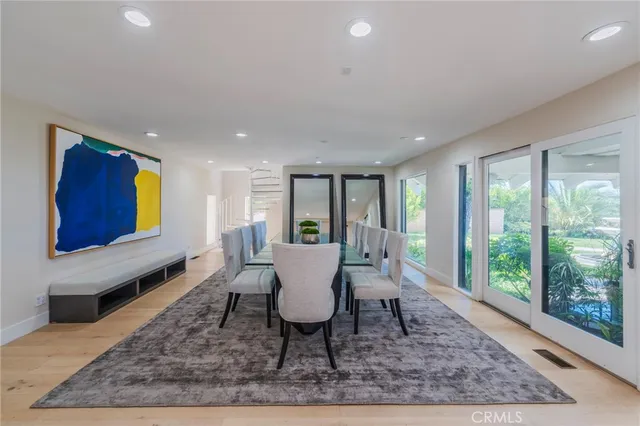 a living room with furniture rug and window