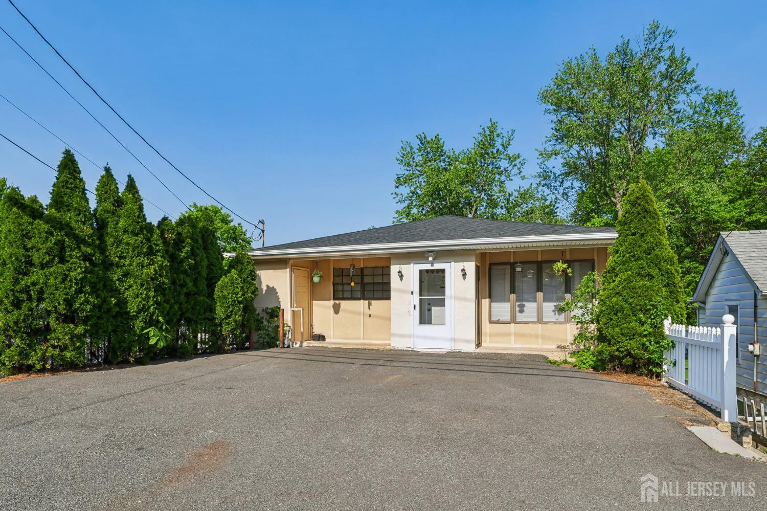 36 Henry Street Edison, NJ 08820 - Photo 2 of 42 front view of a house with a yard