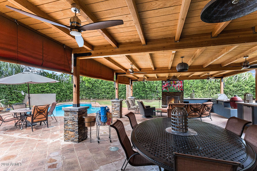 130 East Lawrence Road Phoenix, AZ 85012 - Photo 15 of 18 a view of an outdoor dining space with furniture