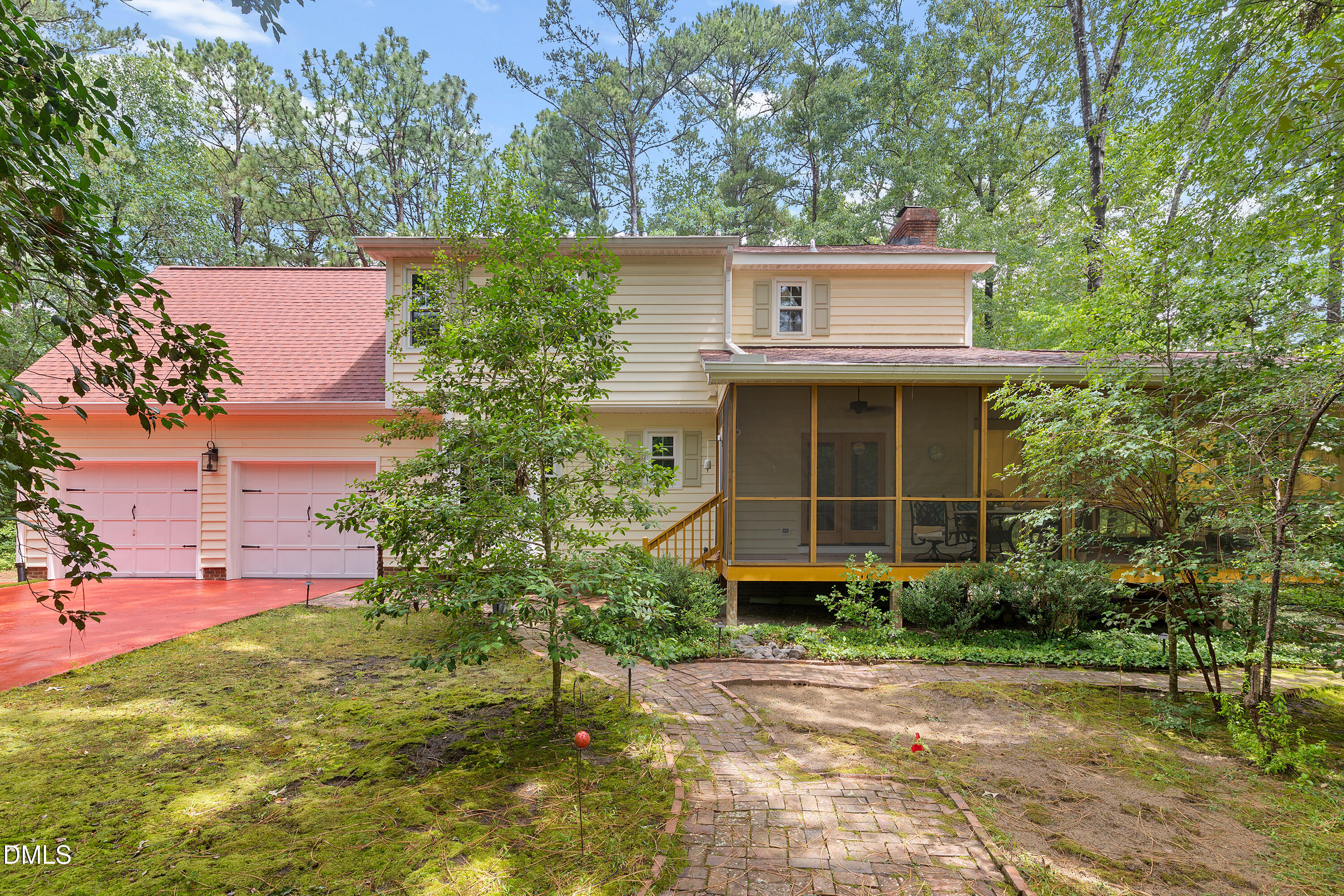 5216 Bridget Drive Raleigh, NC 27603 - Photo 25 of 30 a front view of a house with garden