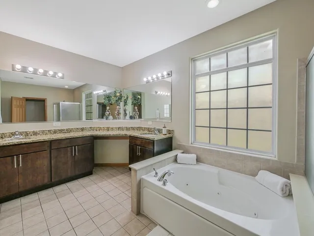 a bathroom with a shower and a shower curtain