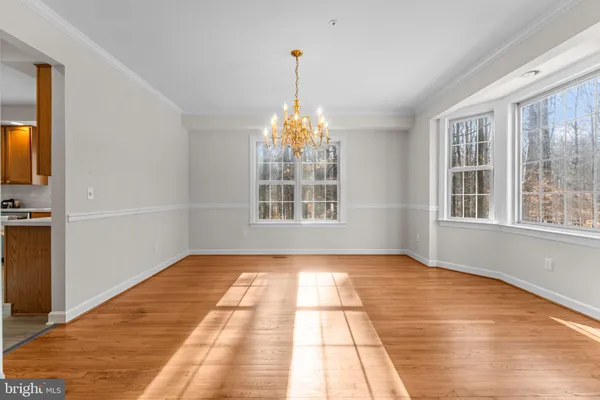 a view of an empty room with storage