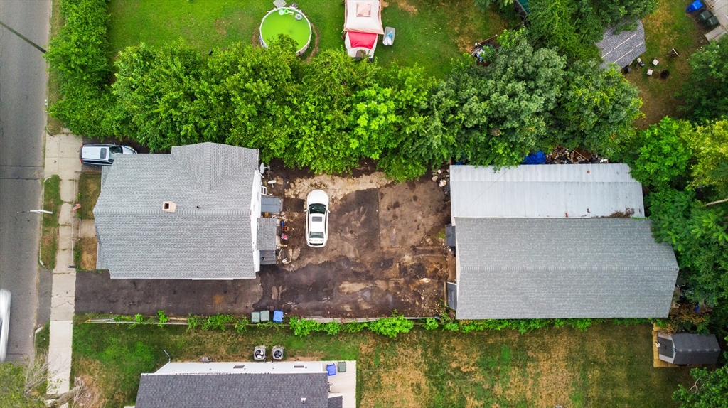234 Allen Street Springfield, MA 01108 - Photo 13 of 14 an aerial view of a house with a yard and a large tree