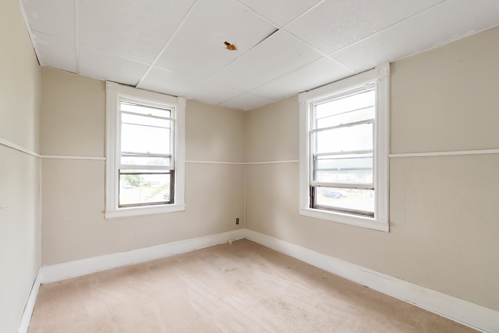 234 Allen Street Springfield, MA 01108 - Photo 7 of 14 an empty room with a window