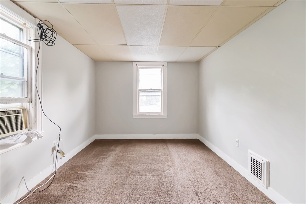 234 Allen Street Springfield, MA 01108 - Photo 8 of 14 an empty room with a window