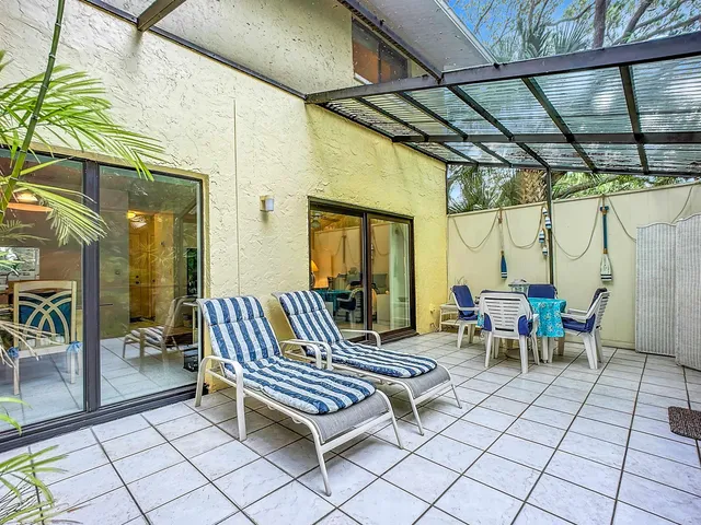 a outdoor space with lots of tables and chairs