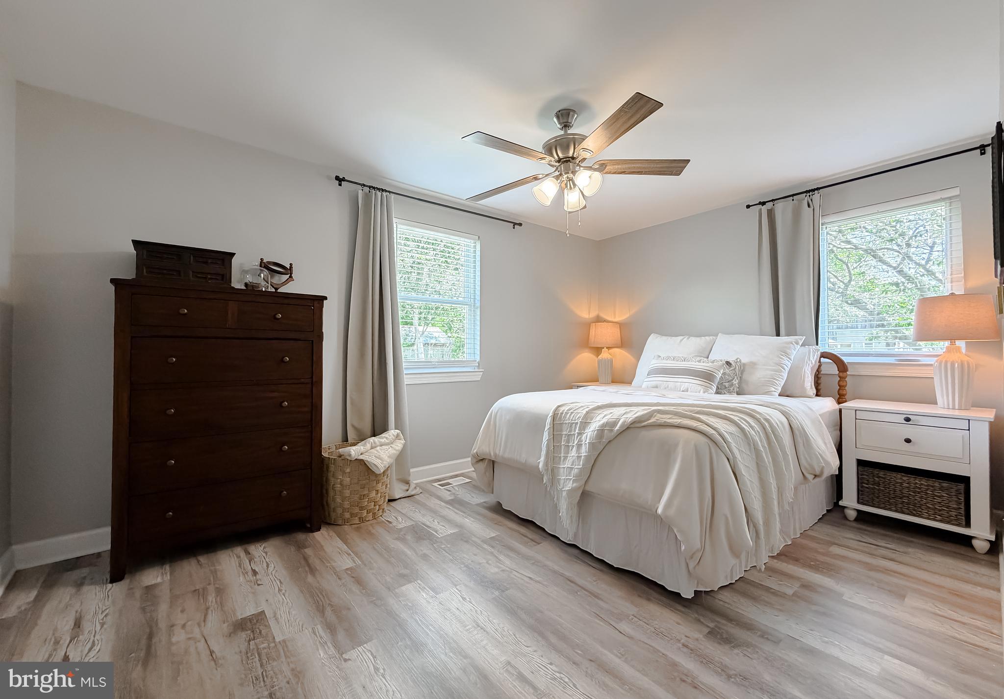 4985 Solomons Island Road Huntingtown, MD 20639 - Photo 16 of 50 a bedroom with a bed and a window