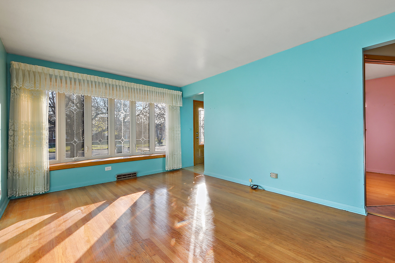 10536 Oak Avenue Chicago Ridge, IL 60415 - Photo 8 of 26 a view of an empty room with a window