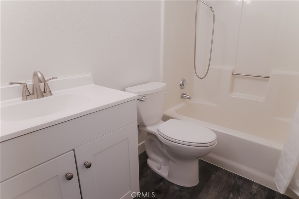 3880 West Jacinto View Road, Unit A Banning, CA 92220 - Photo 12 of 21 a bathroom with a sink toilet and shower