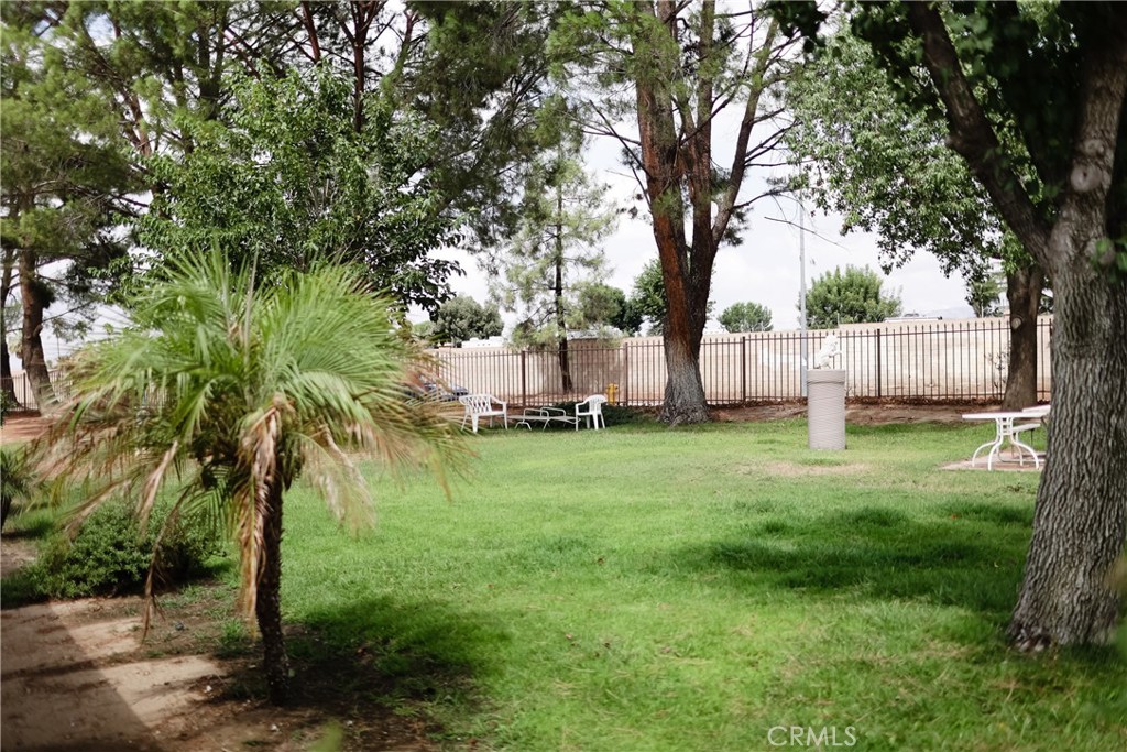 3880 West Jacinto View Road, Unit A Banning, CA 92220 - Photo 18 of 21 a view of backyard with large trees