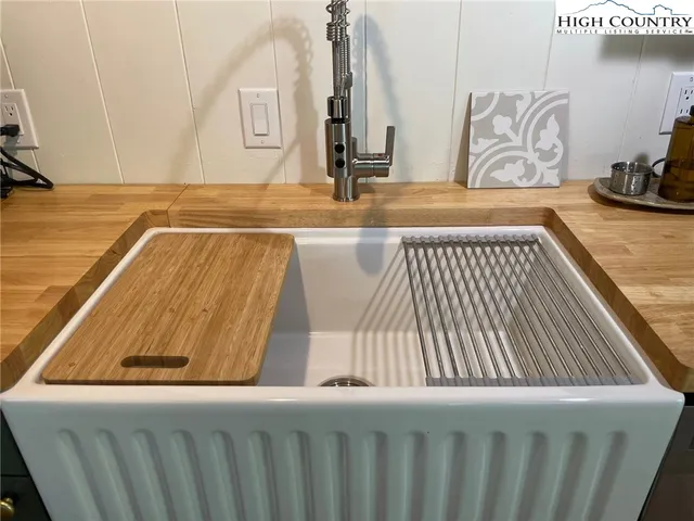 a kitchen with a stove and a refrigerator